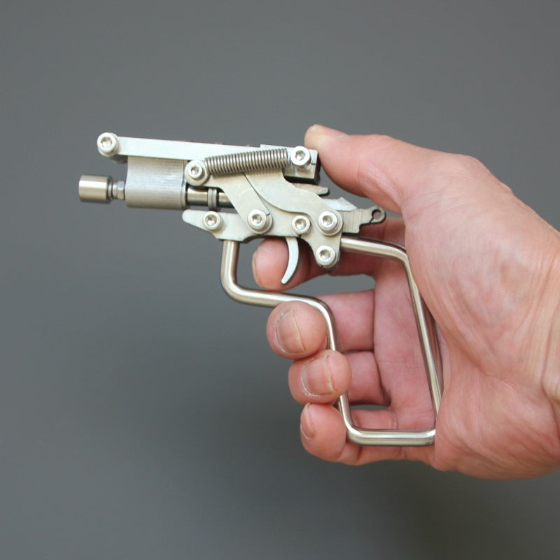 Stainless Steel Lancer: Vintage Rattleback Gun