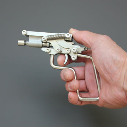 Stainless Steel Lancer: Vintage Rattleback Gun